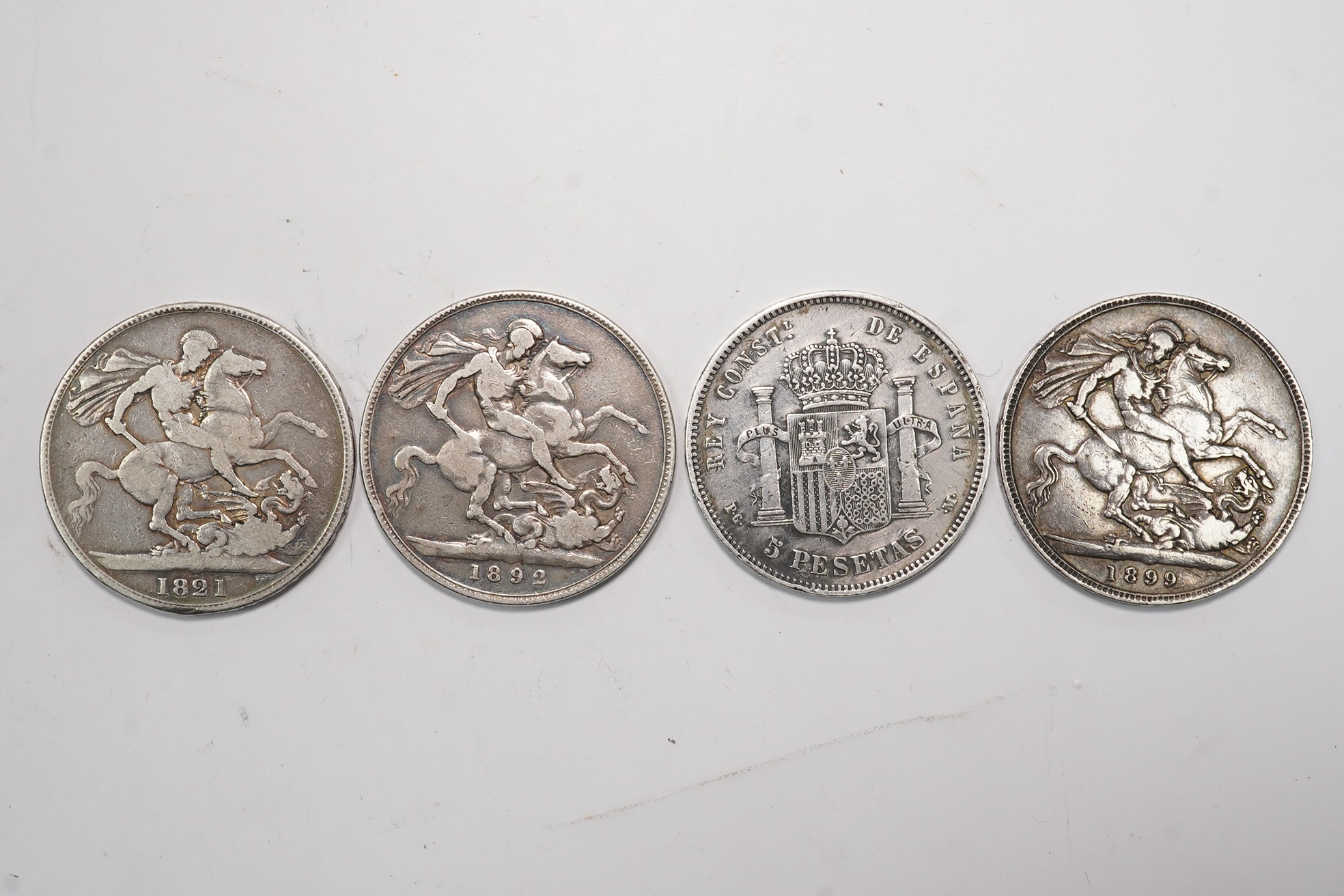 19th century British and Spanish silver coins, three crowns - George IV, 1821, Victoria 1892 and 1899, Spain 5 pesetas 1890 PGM, VG to VF (4)